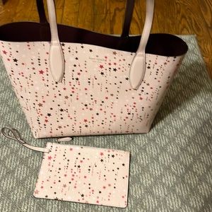 Authentic Kate Spade tote with matching wristlet.